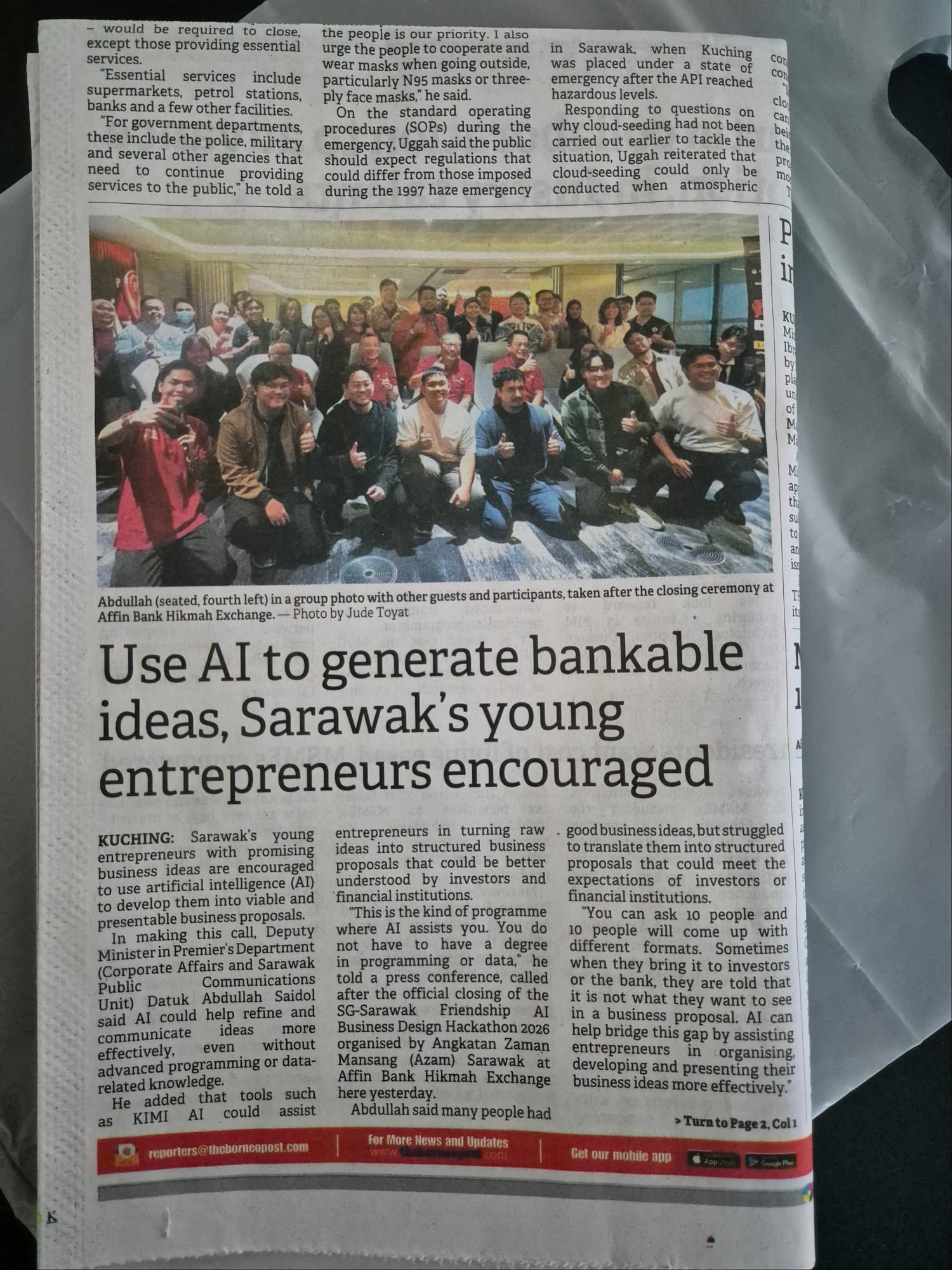 Print edition of The Borneo Post's coverage of the AI Business Design Hackathon 2026 closing ceremony, headlined Use AI to generate bankable ideas, Sarawak's young entrepreneurs encouraged
